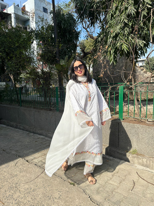 Afreen White Embroidered Kurta Set Long by Pyoor with colorful embroidery on cotton fabric.