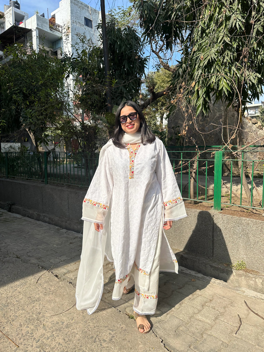 Afreen White Embroidered Kurta Set Long by Pyoor featuring straight pants and beautiful embroidery.