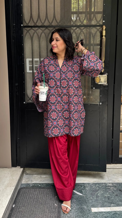 Ajrak Farshi Salwar Suit Set by Pyoor with relaxed fit kurta and all-over Ajrak print details.