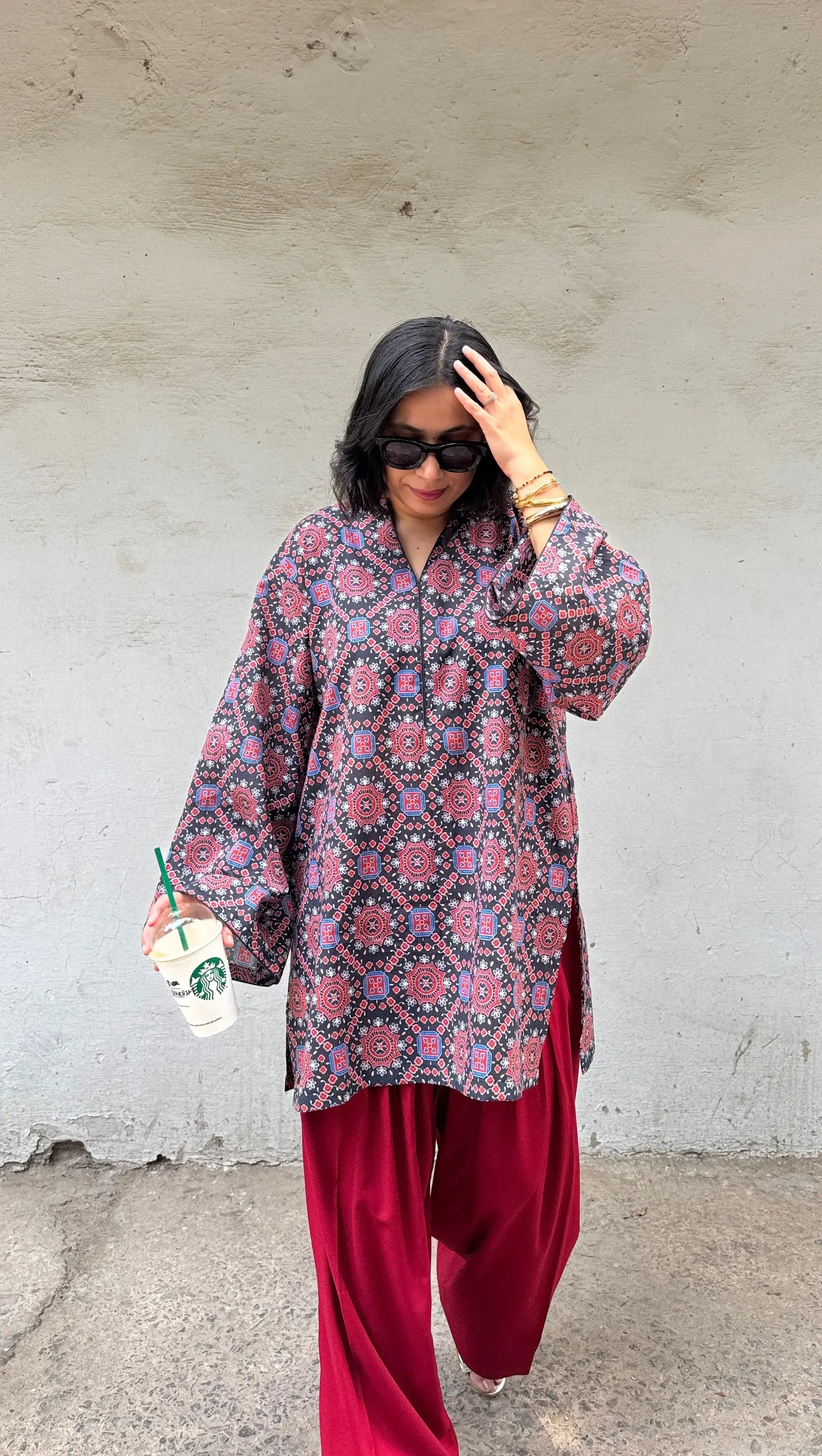 Pyoor's Ajrak Farshi Salwar Suit Set styled with Ajrak print kurta and broad mori red salwar.