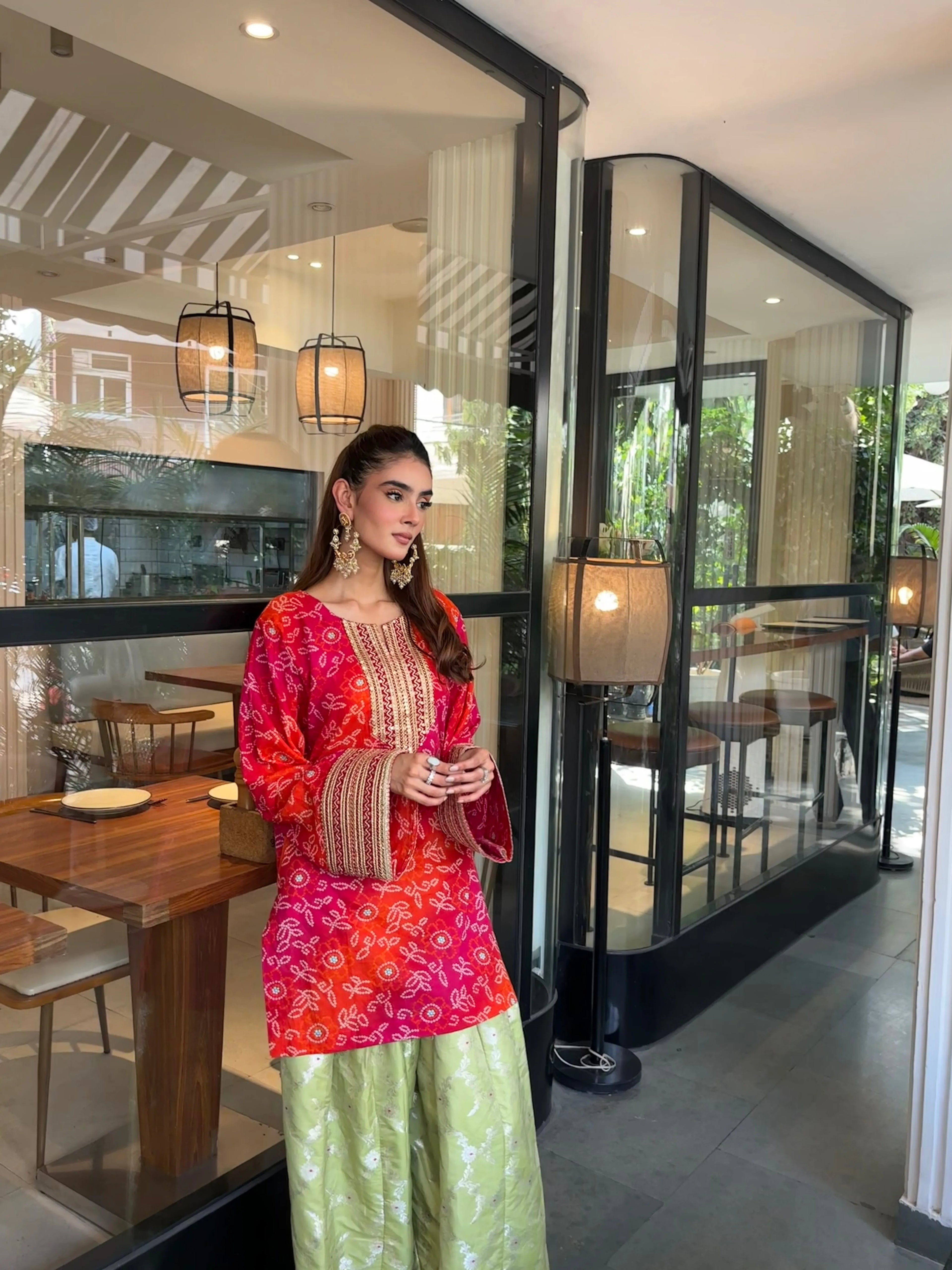 Alia Bandhani Farshi Set by Pyoor featuring a red and orange Bandhani design