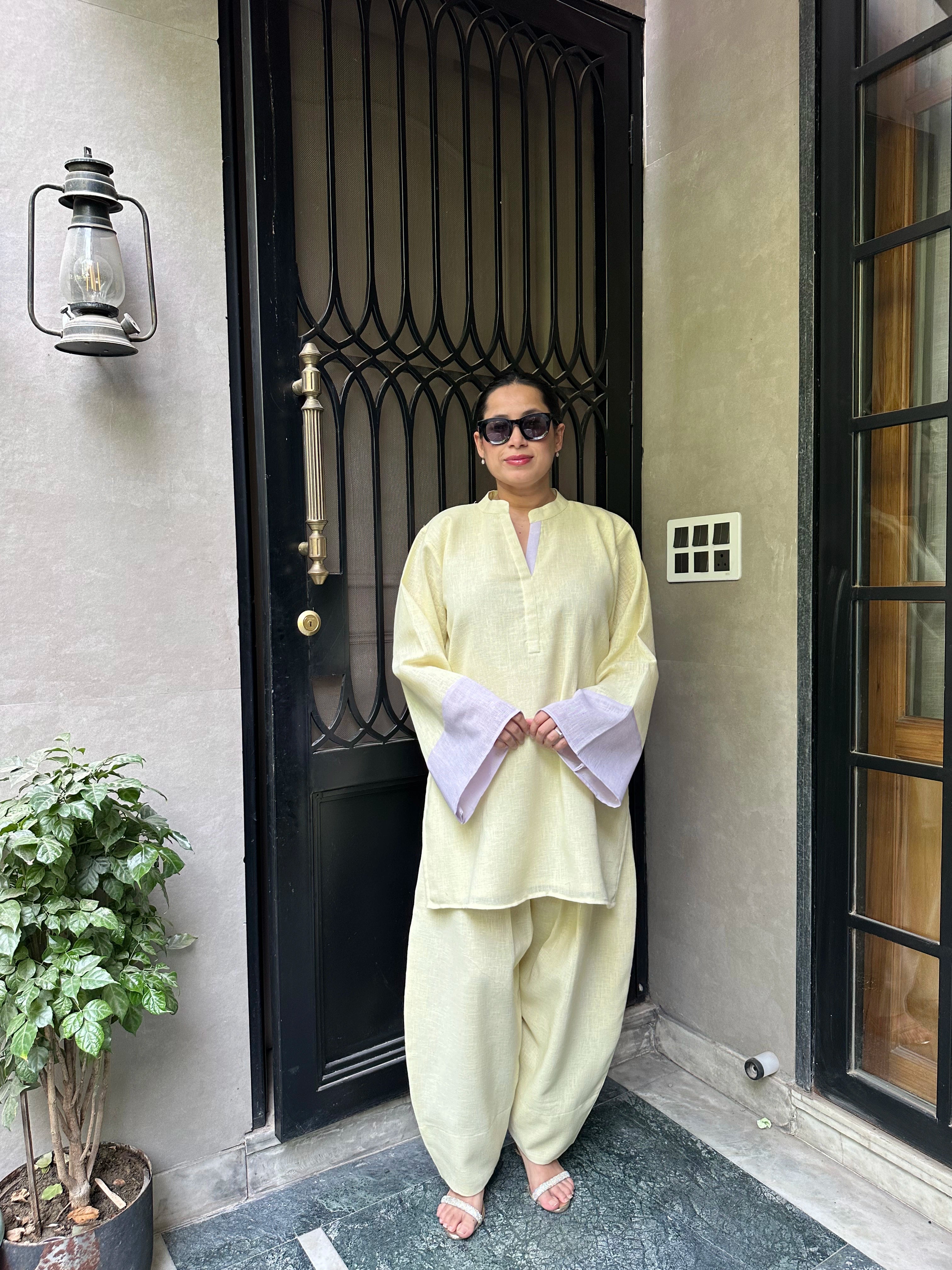 Candy Balloon Salwar Set by Pyoor with yellow lavender colorblock and bell sleeves