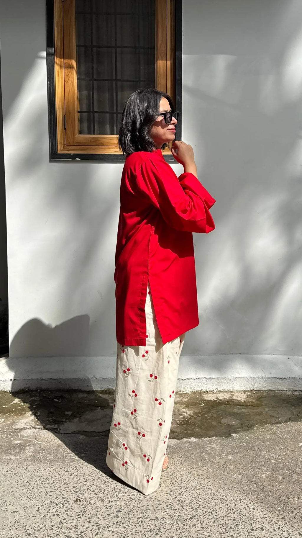 Pyoor Cherry Farshi Salwar Set featuring red oversized kurta with cotton embroidered salwar.