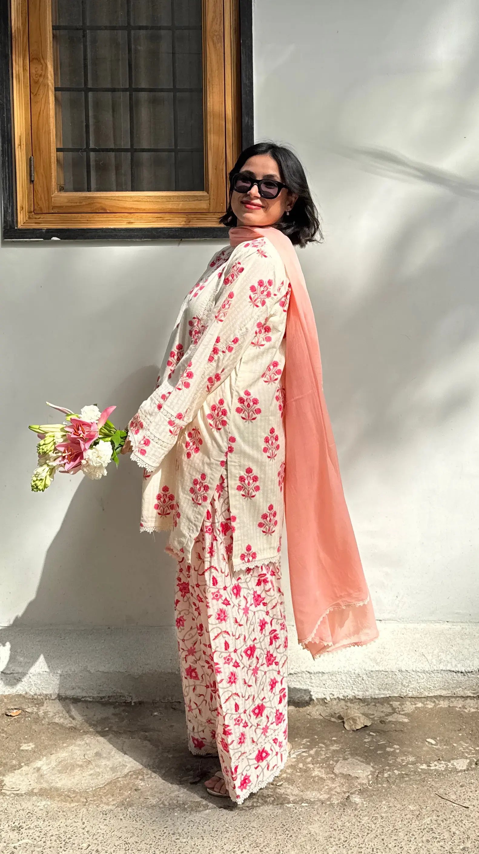 Pyoor Dhaaga Block Print Farshi Kurta Set in Pinkish Red with floral bootie print.