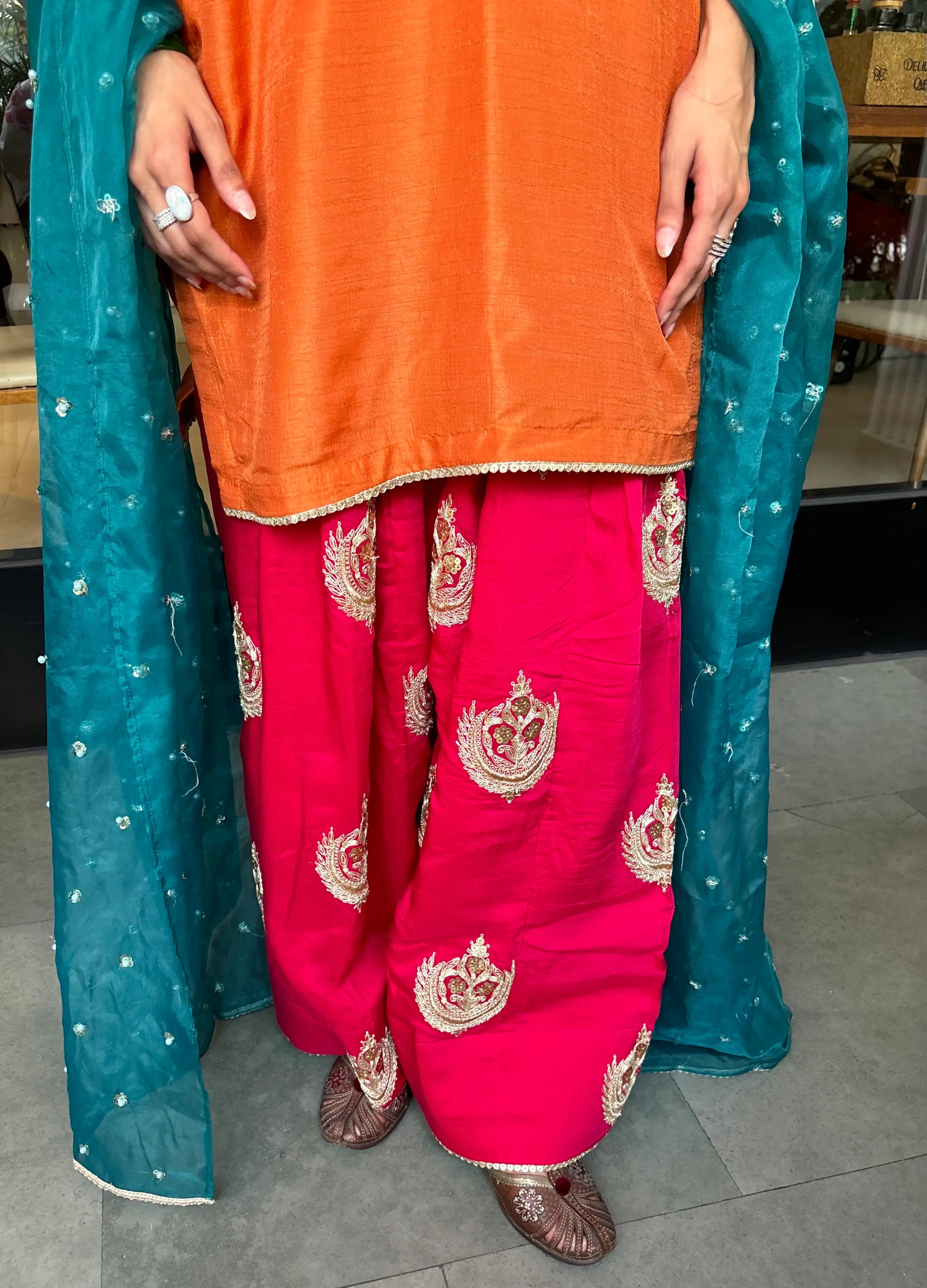 Gulshan Orange Contrast Farshi Set by Pyoor with embroidered details and graceful contrast styling
