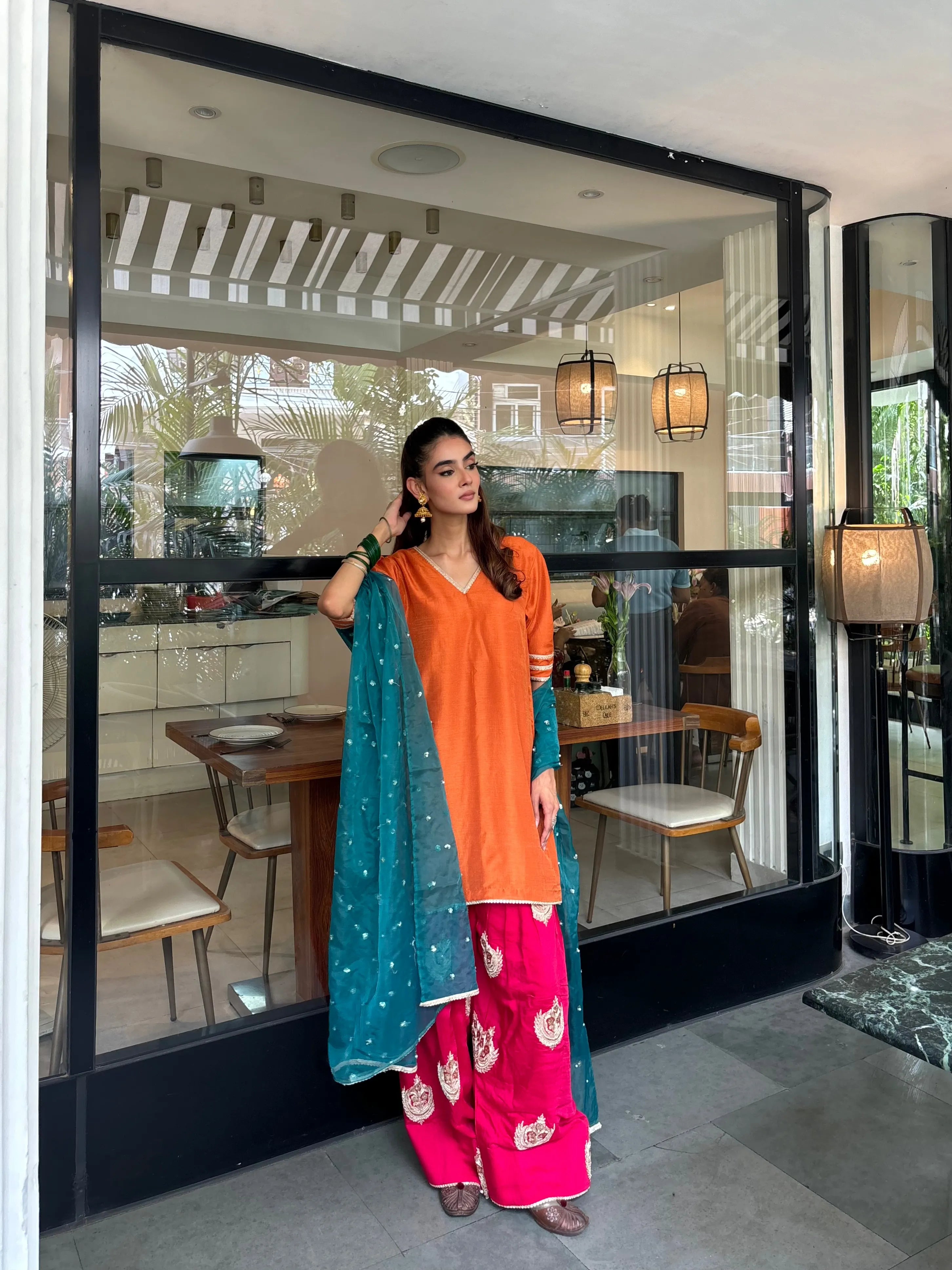 Gulshan Orange Contrast Farshi Set by Pyoor crafted in soft silk fabric