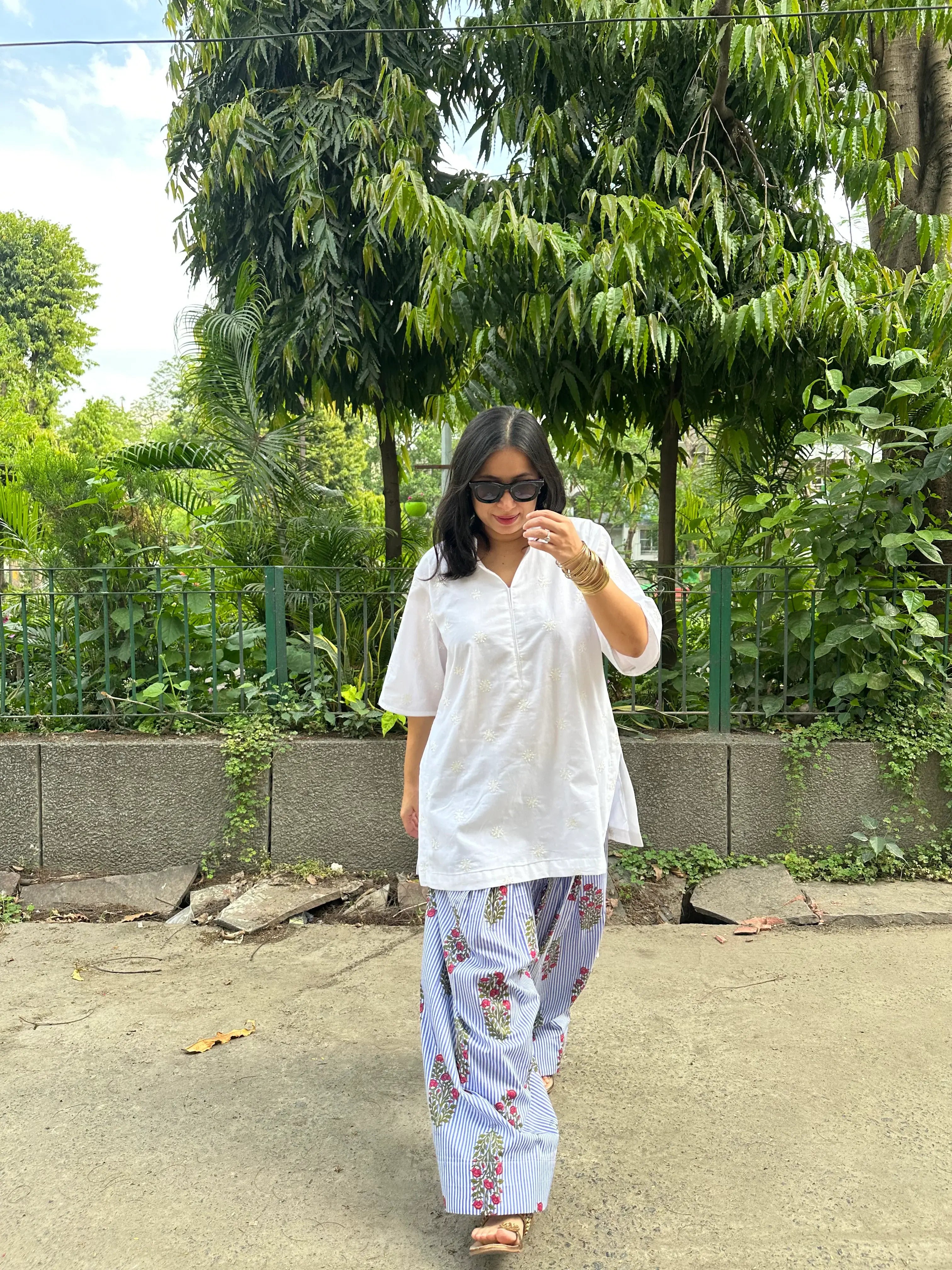 Jasmine Striped Farshi Set by Pyoor featuring white embroidered cotton kurta and striped salwar