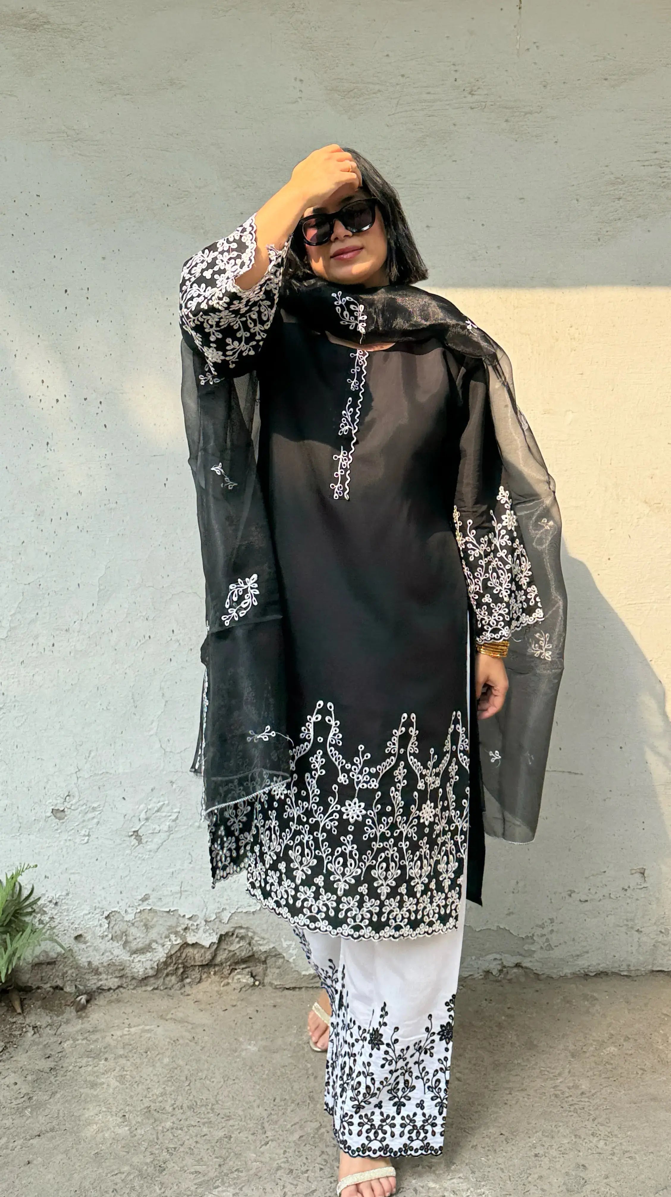 Kalighata Suit Set in oversized fit by Pyoor with black embroidery and organza dupatta