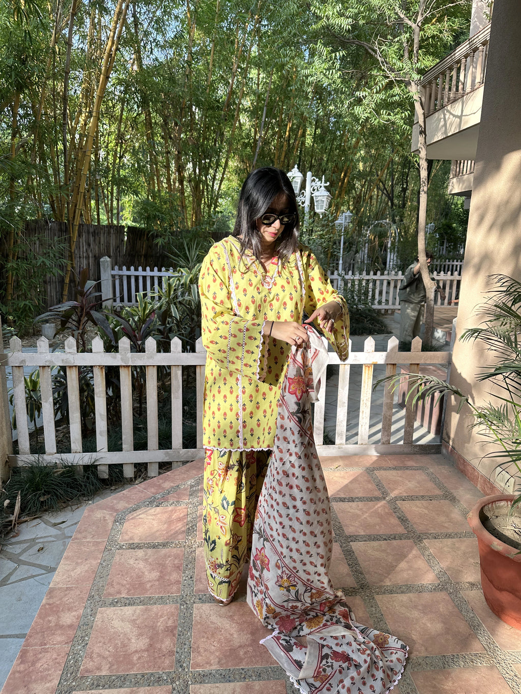 Lia Green Pastel Farshi Set by Pyoor with floral patterns and contrast dupatta