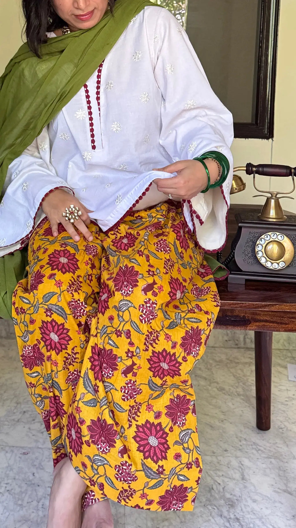 Pyoor Marigold Farshi Salwar Suit Set featuring yellow printed salwar and soft green dupatta.