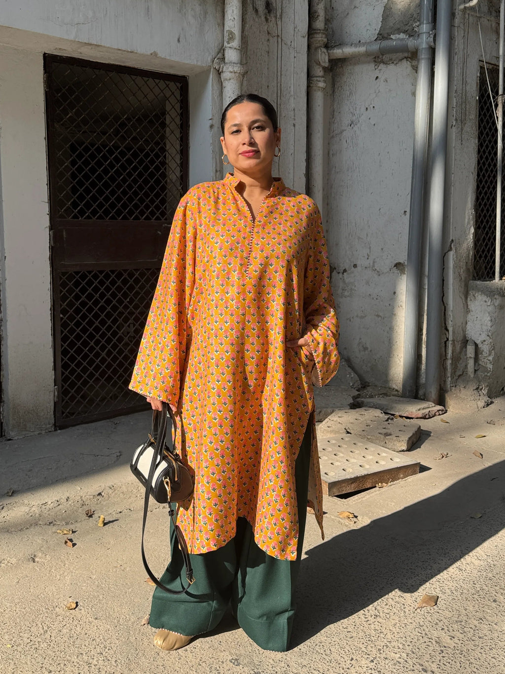 Pyoor Marigold Winter Pashmina Farshi Set with warm collared kurta and green salwar