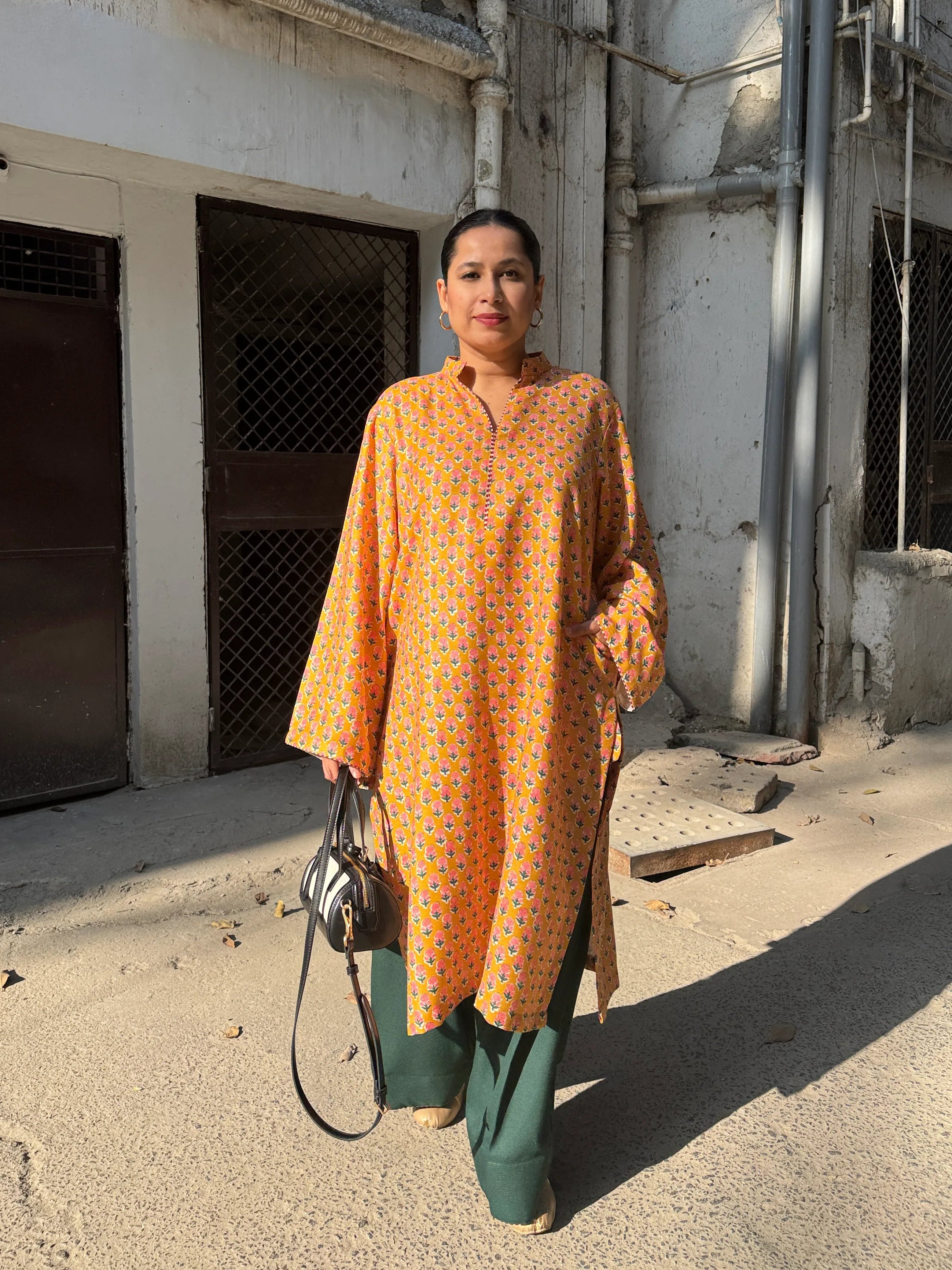 Marigold Winter Pashmina Farshi Set by Pyoor with long collared kurta in oversized fit