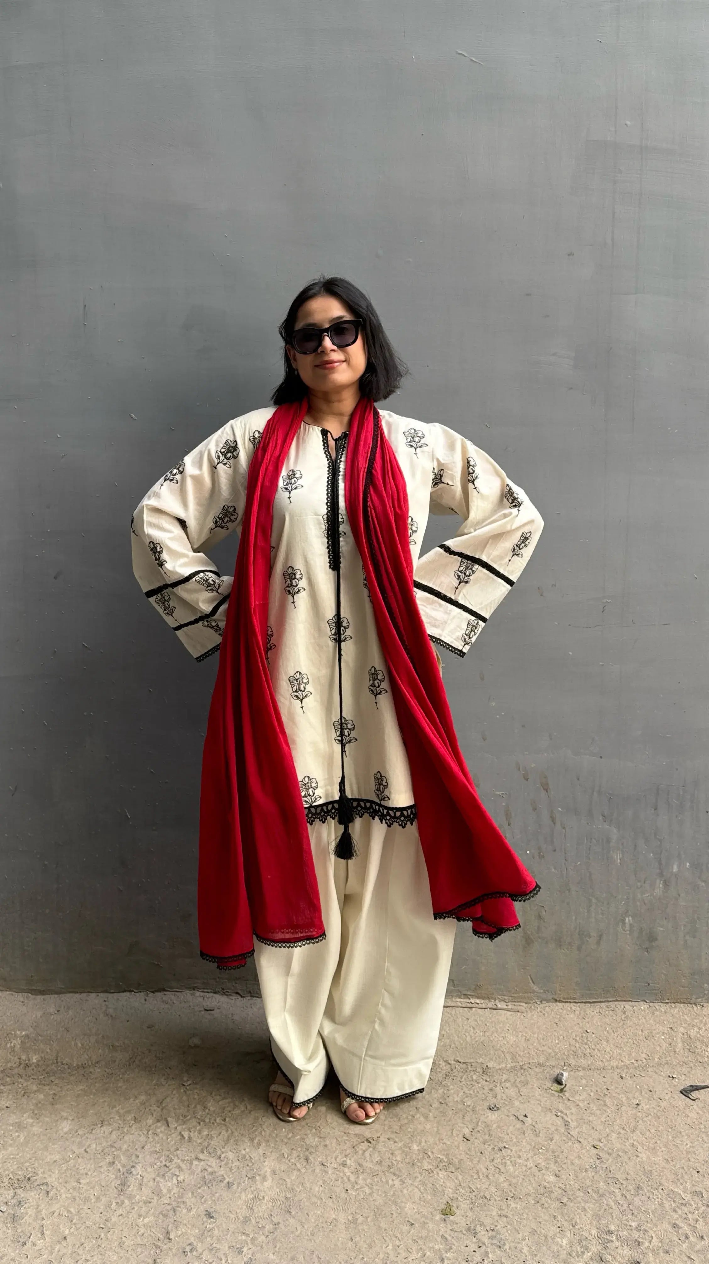 Mira Farshi Salwar Suit Set in off white cotton by Pyoor with lace and tassel details.