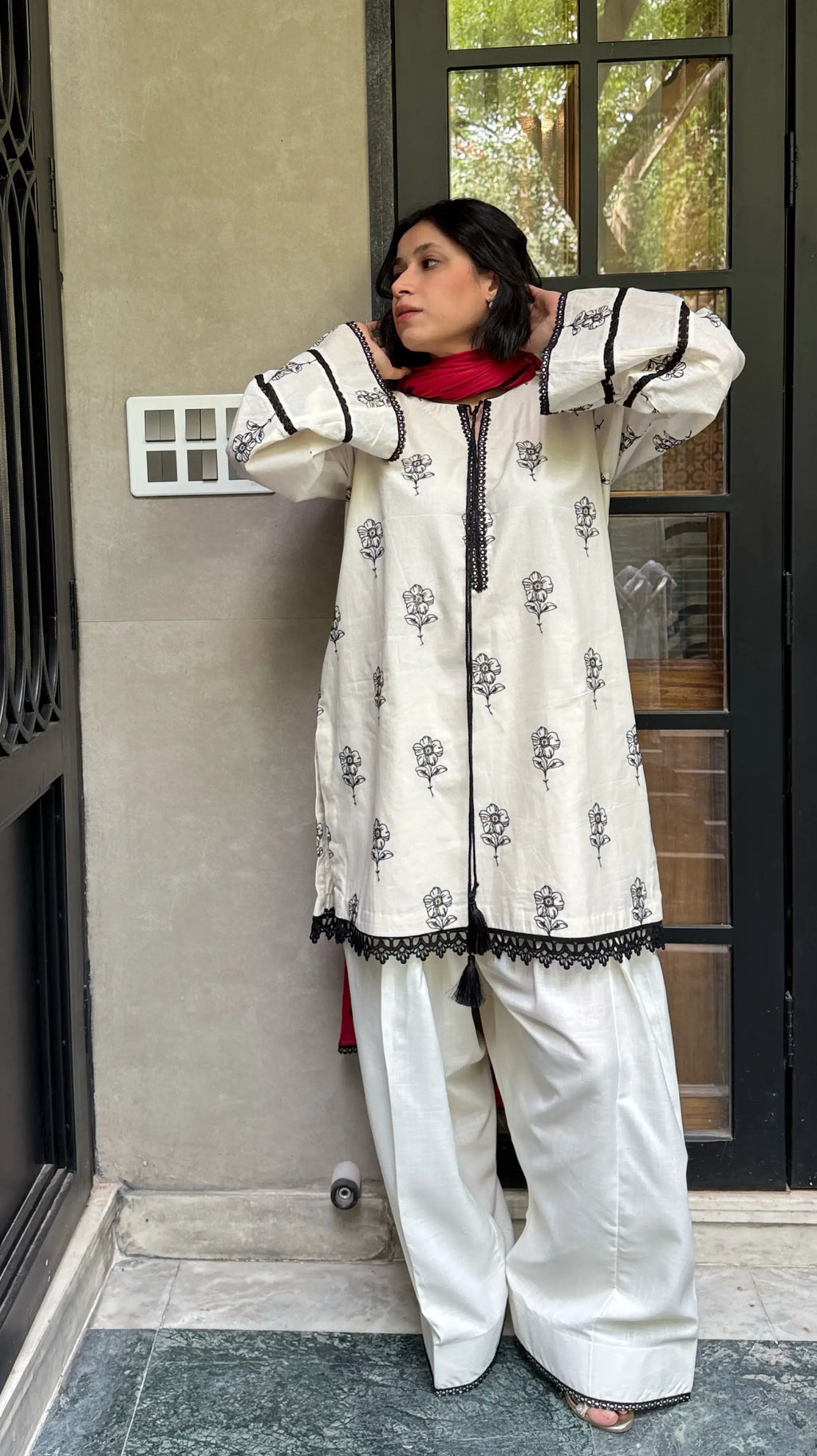 Off white Mira Farshi Salwar Suit Set by Pyoor featuring oversized kurta and wide pauncha.