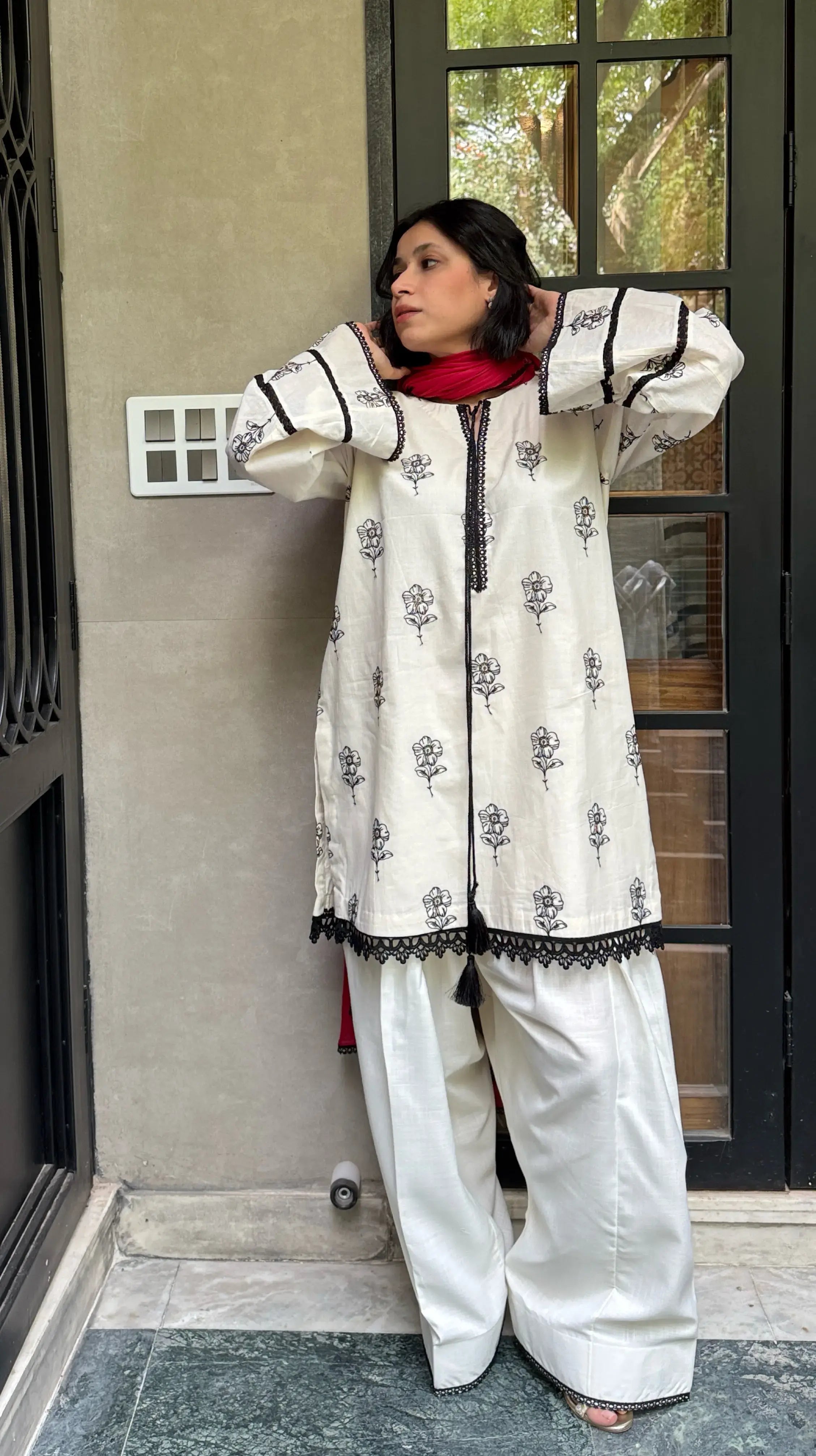 Off white Mira Farshi Salwar Suit Set by Pyoor featuring oversized kurta and wide pauncha.