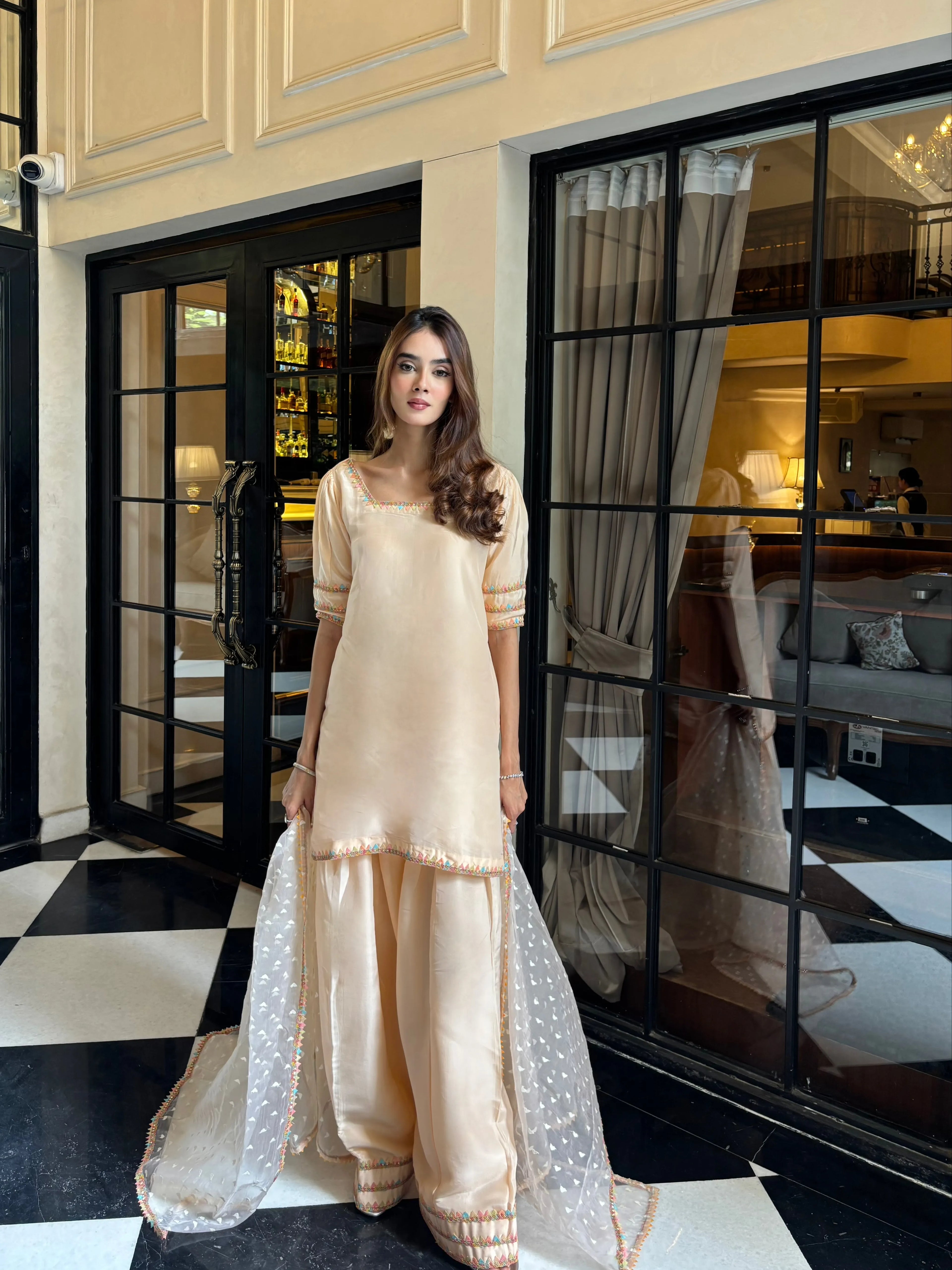 Nazm Peach Silk Farshi Set by Pyoor crafted in premium Upada silk with an oversized fit
