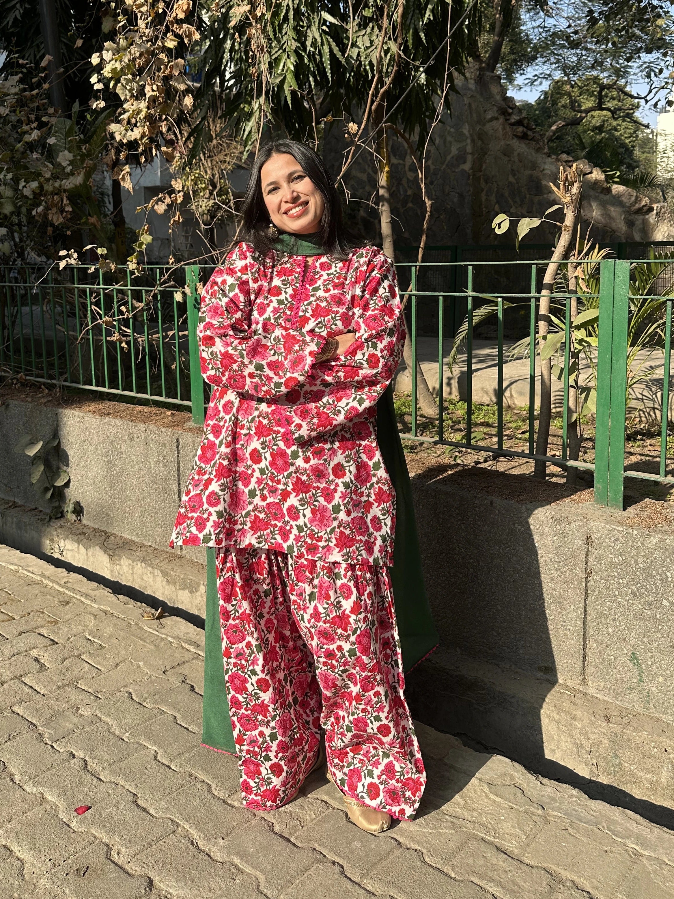 Nooria Floral Farshi Set Pyoor paired with dark green chinon dupatta