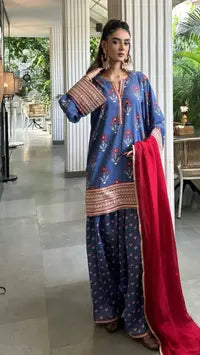 Festive Ranibagh Farshi Set from Pyoor with lace work and flowy organza dupatta.