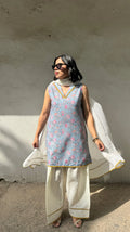 Sky Farshi Salwar Set by Pyoor in soft blue cotton with lace details and floral prints