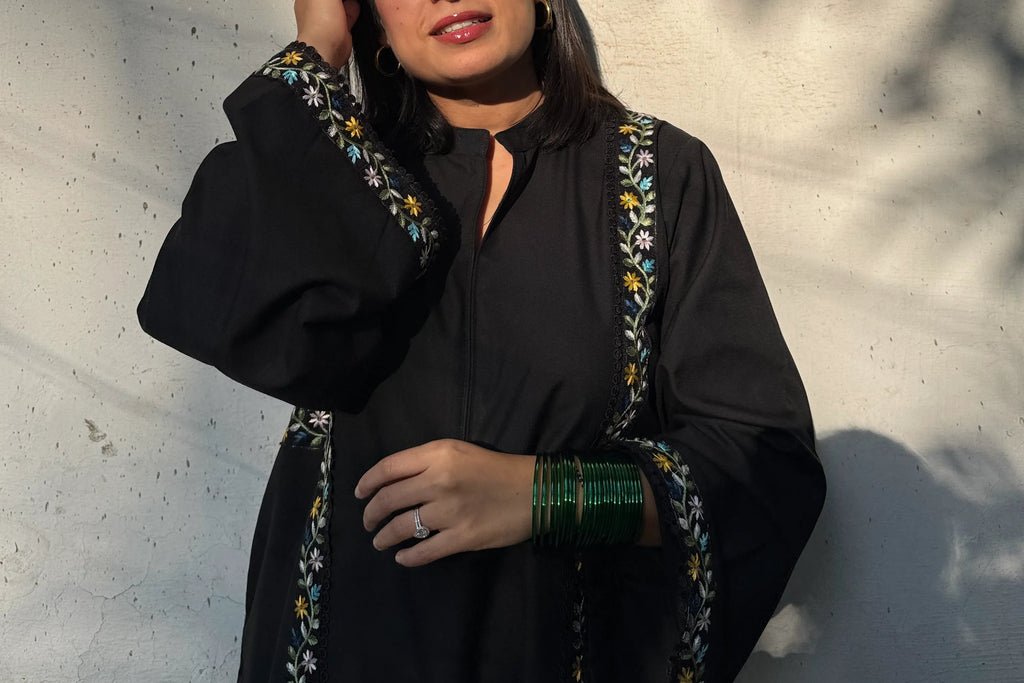 Solids Black Pashmina Farshi Set from Pyoor with loose salwar and lace kurta design