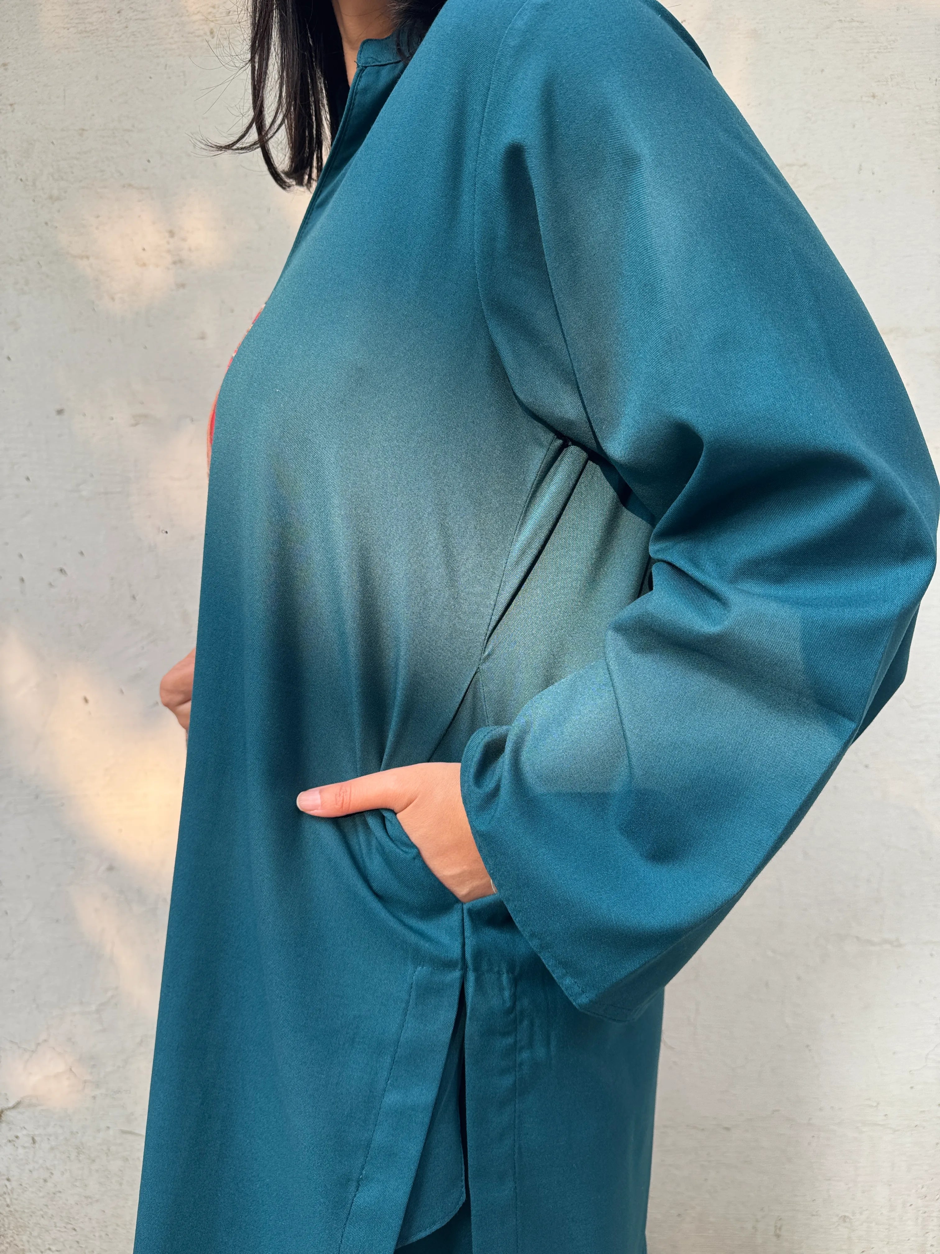 Solids Ferozi Green Winter Spun Set by Pyoor with winter spun kurta and matching farshi salwar