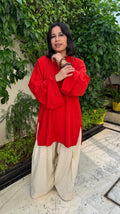Solids Orange Farshi Set by Pyoor – elegant cotton festive wear with relaxed oversized fit.