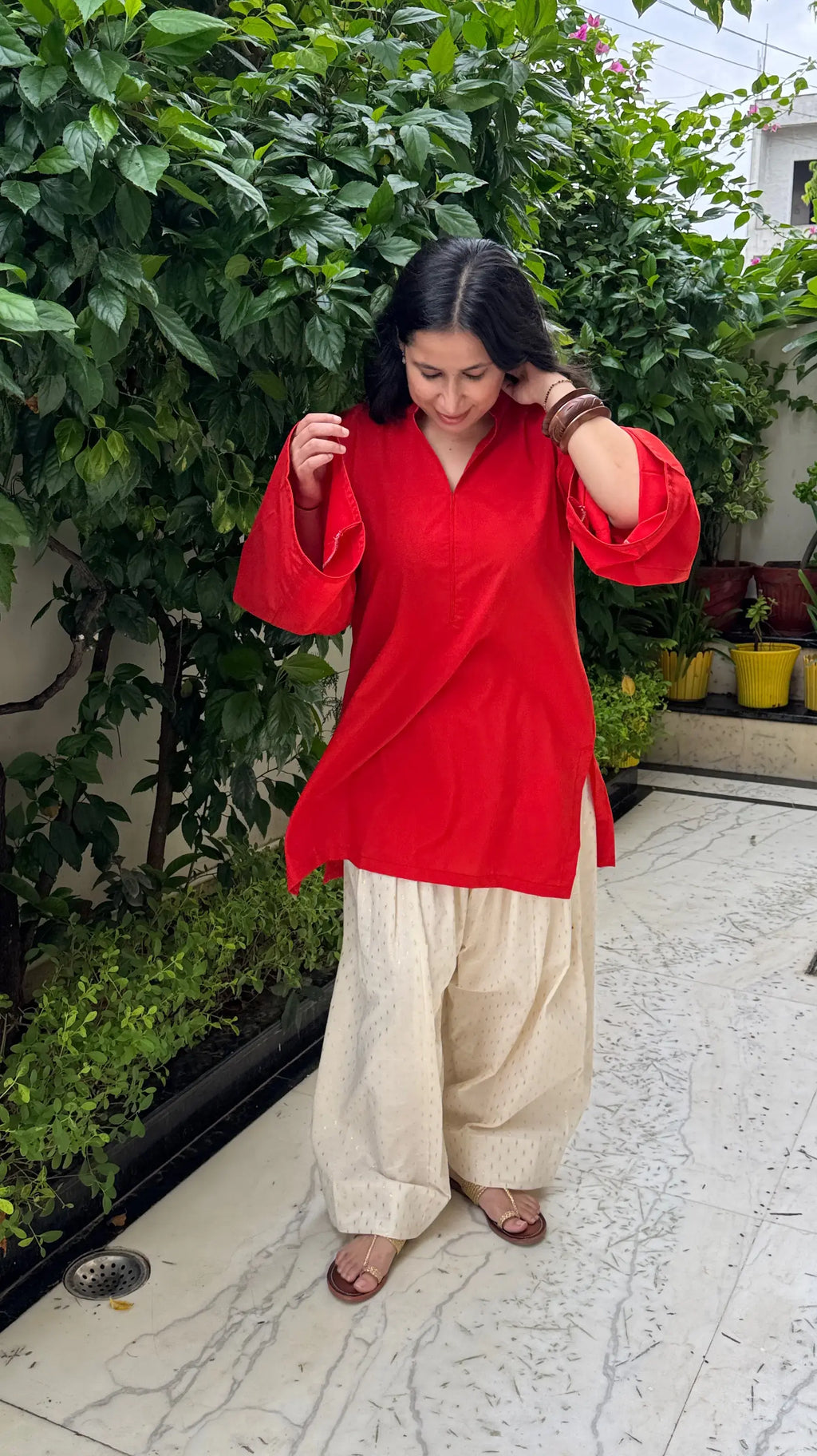 Minimal festive Solids Orange Farshi Set from Pyoor crafted in breathable cotton fabric.