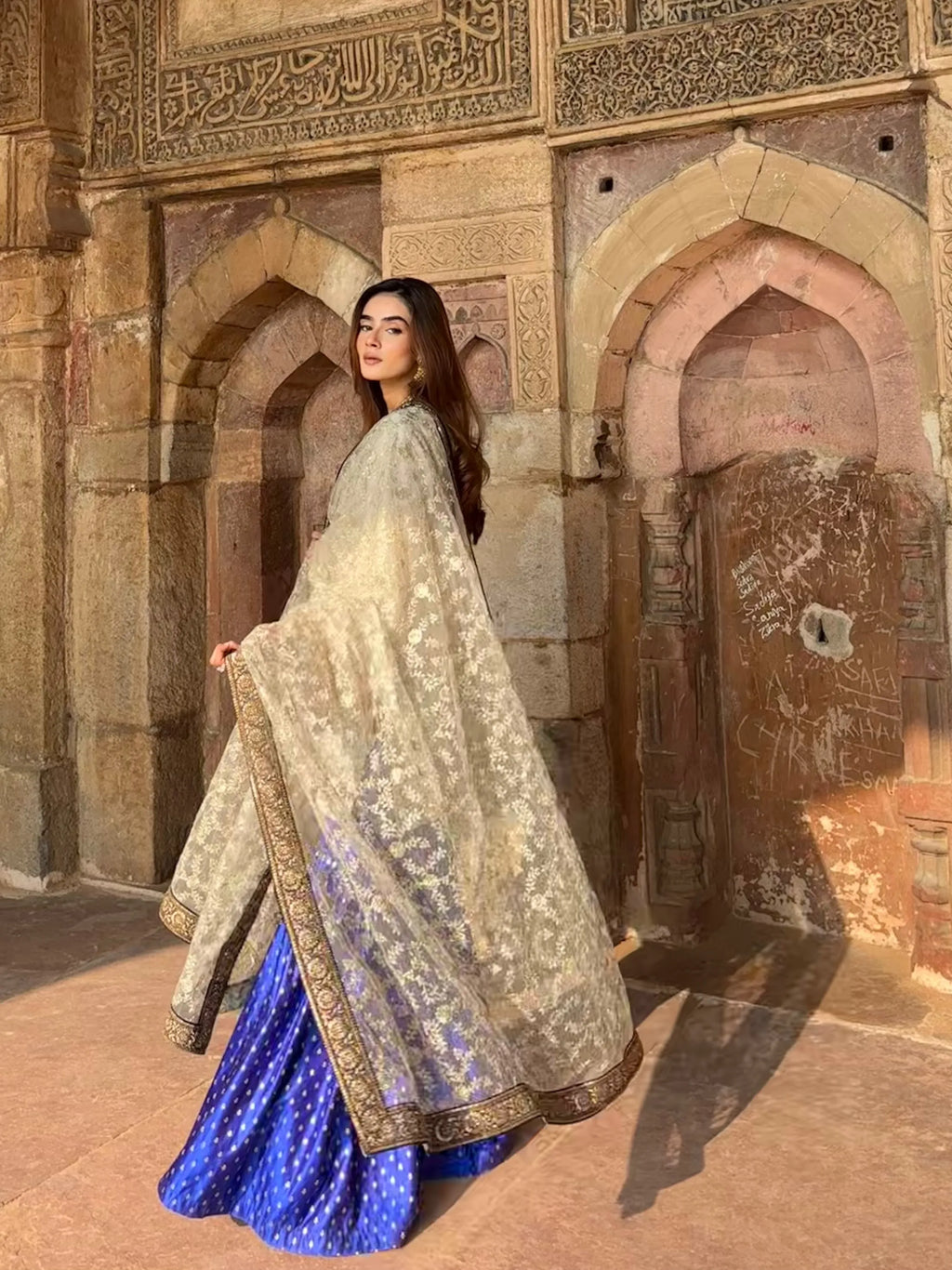 Umrao Sharara Set styled with embroidered net kurta and brocade sharara