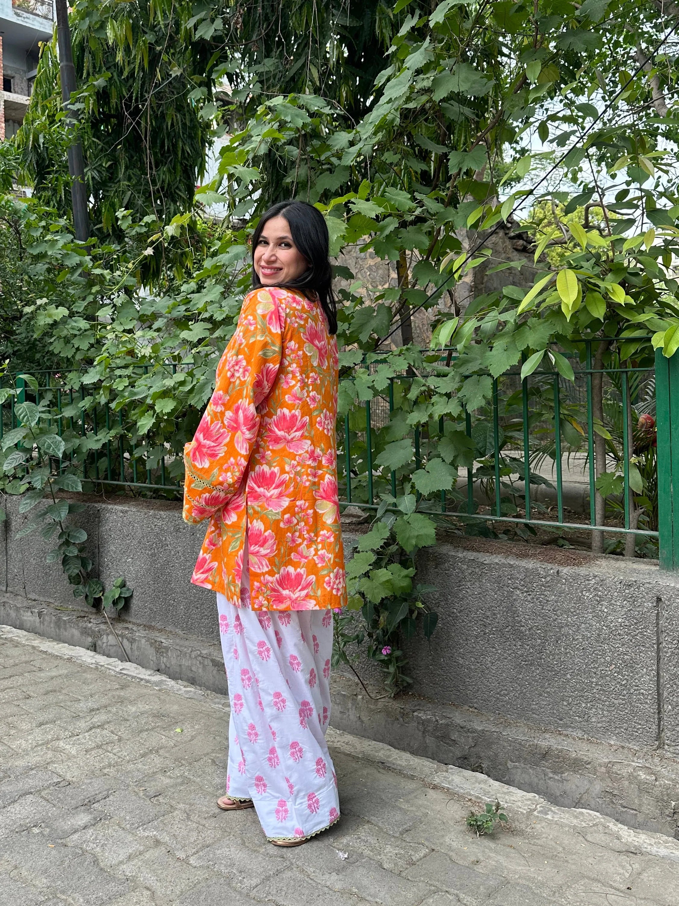 Zinnia Floral Farshi set by Pyoor featuring floral cotton kurta and pink embroidered motifs