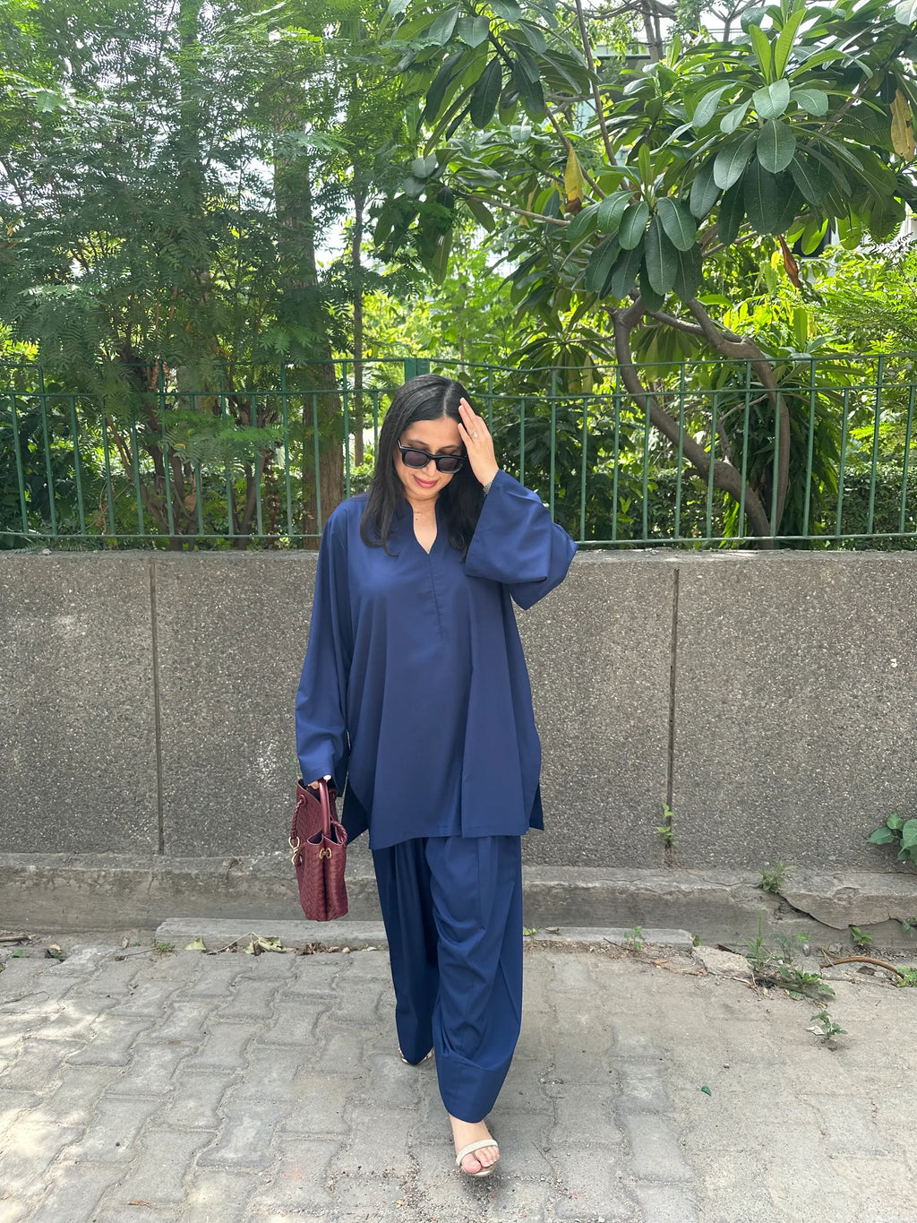 Solids Navy Blue Farshi by Pyoor with navy blue tones and practical pockets