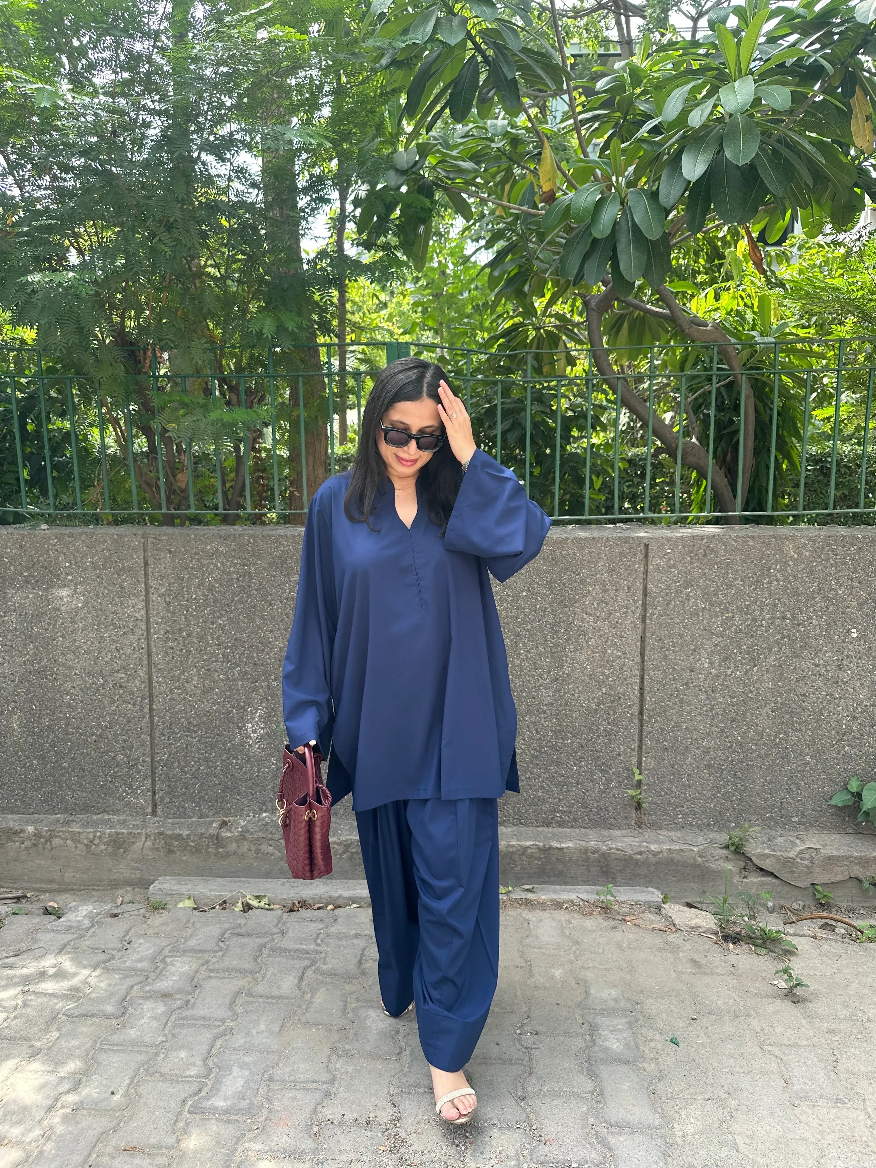 Solids Navy Blue Farshi by Pyoor with navy blue tones and practical pockets